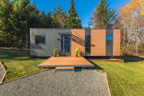 A house with a lot of windows and stairs