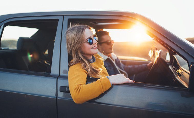 Couple Enjoy Sunset Roadtrip — Gautier, MS — Coastal Insurance Associates, Ltd