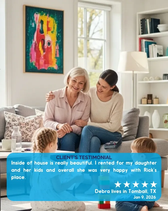 A woman is smiling while sitting on a couch.