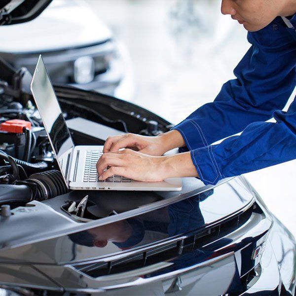 Mechanic Checking the Engine — Mayne Street Auto in Gulgong, NSW