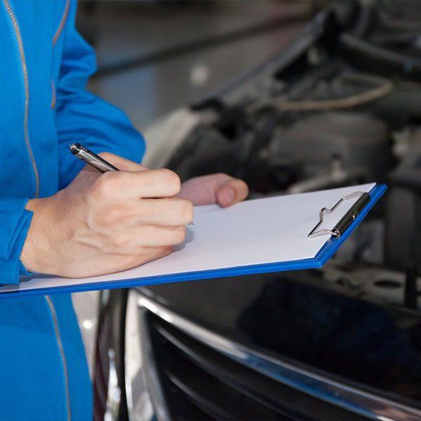 Mechanic Engineer Taking Notes — Mayne Street Auto in Gulgong, NSW