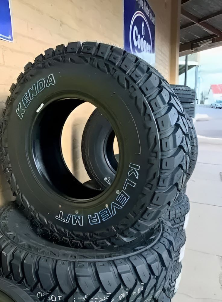 A Bunch of Tires Are Stacked on Top of Each Other — Mayne Street Auto in Gulgong, NSW