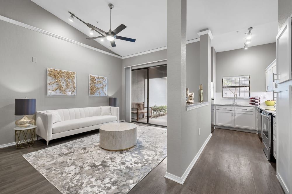 Living room and kitchen at Marquis at Waterview in Richardson, TX.
