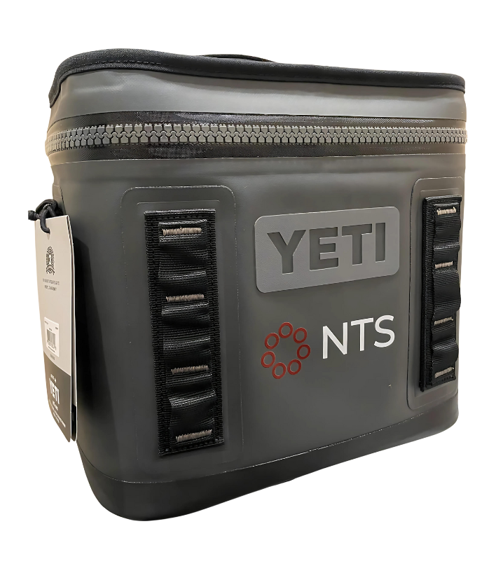 A yeti cooler bag with a logo on it is on a white background.