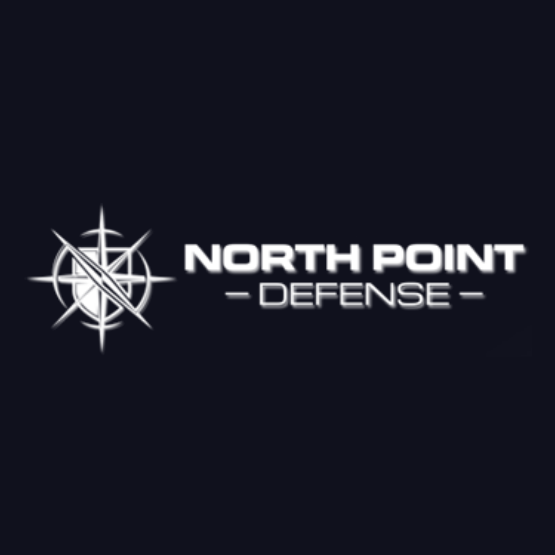 a logo for north point defense with a compass on a black background
