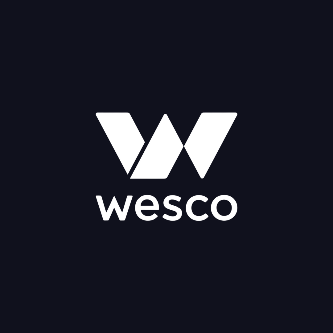 a wesco logo on a dark blue background