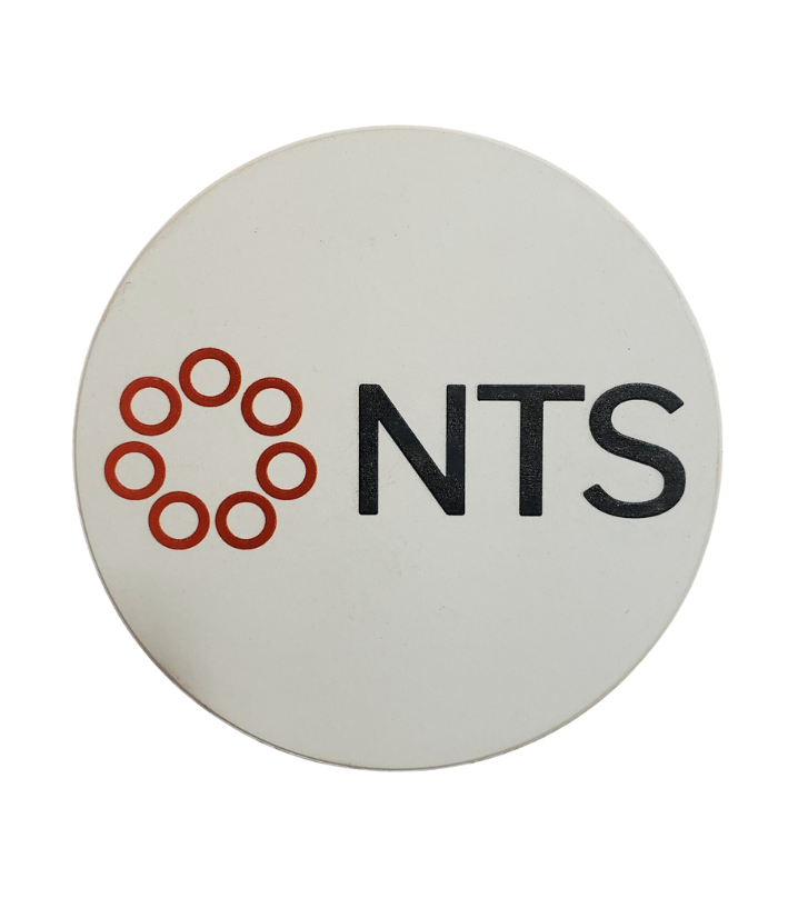 A white button with the word nts on it