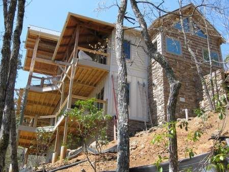 house being built on a slope in the mountains featherstone