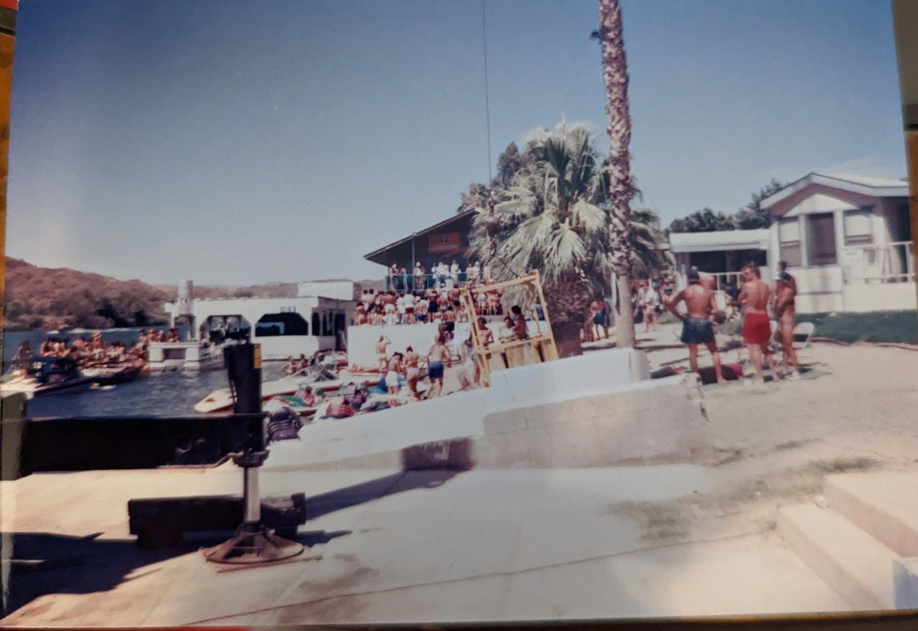A group of people are standing in front of a building