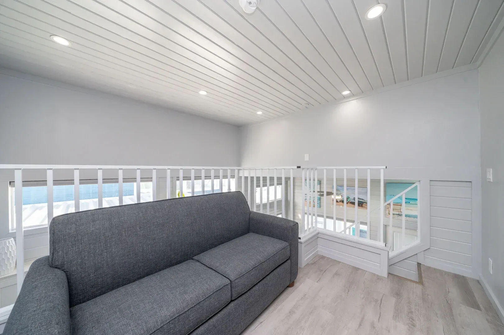 There is a couch in the middle of the room.