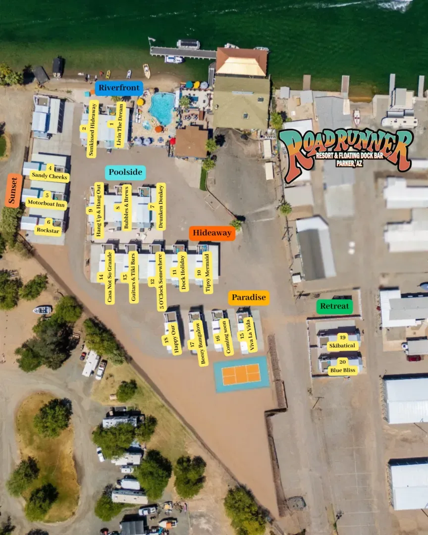 An aerial view of a campground with a rv park in the background