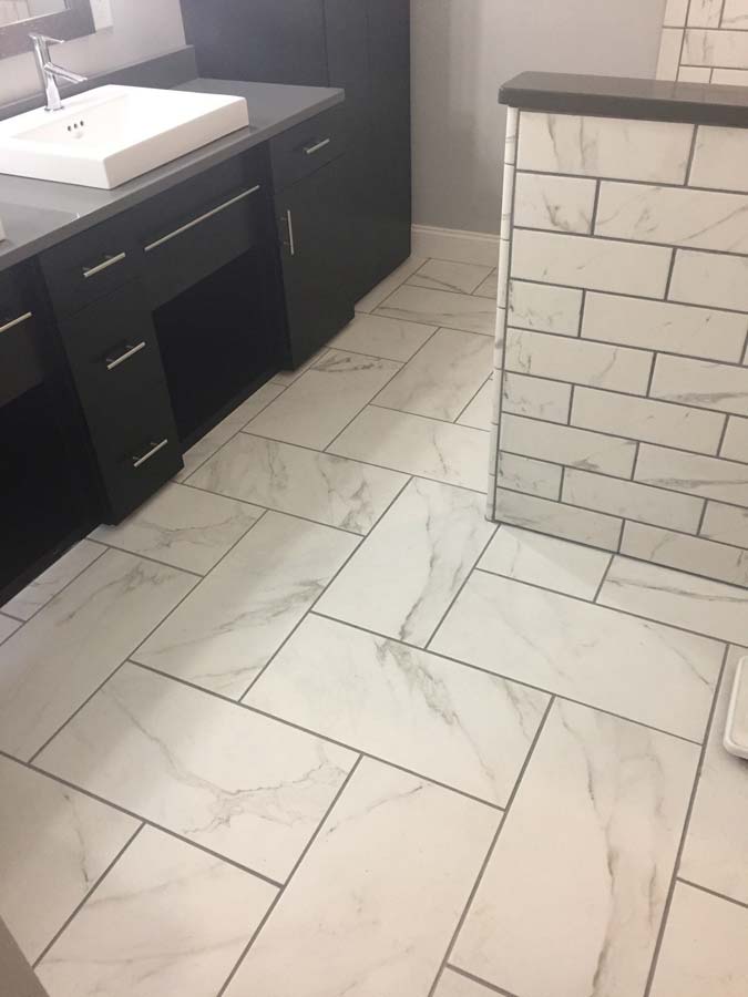 Bathroom Remodeling — Bathroom with White Tiles in Amsterdam, NY