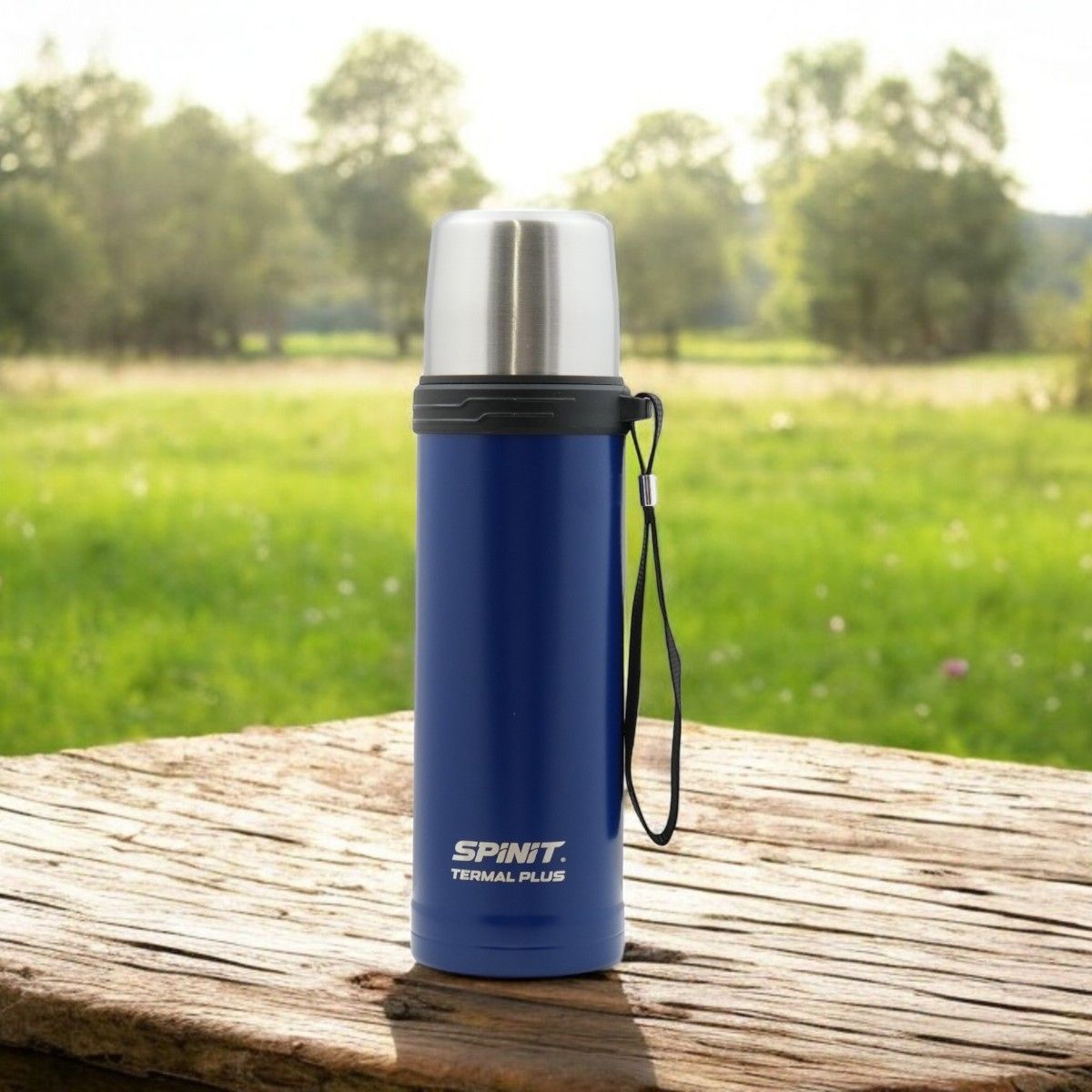 Termos Spinit Termal Plus azul junto a su caja.