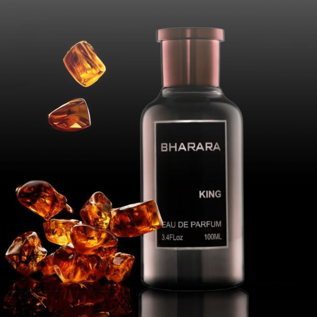 Frasco de perfume Bharara King con caja; tonos azul oscuro y marrón.