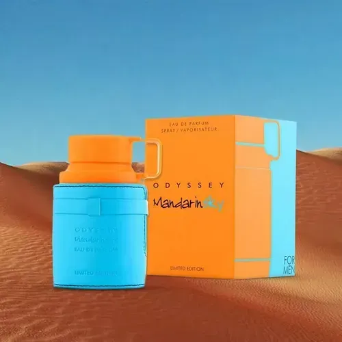 Caja naranja y frasco de perfume azul, edición limitada “Odyssey Mandarin”.