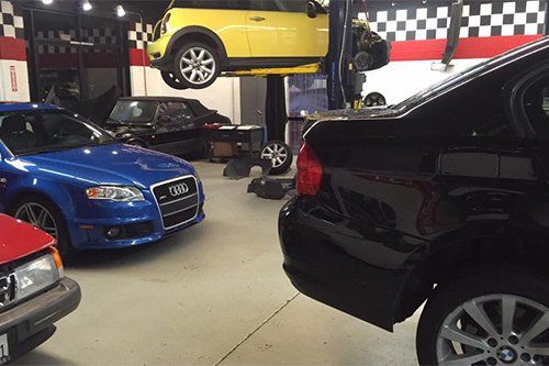 Repair Service — Mechanic Checking Auto in Santa Cruz, CA Repair Service — Mechanic Checking Auto in Santa Cruz, CA