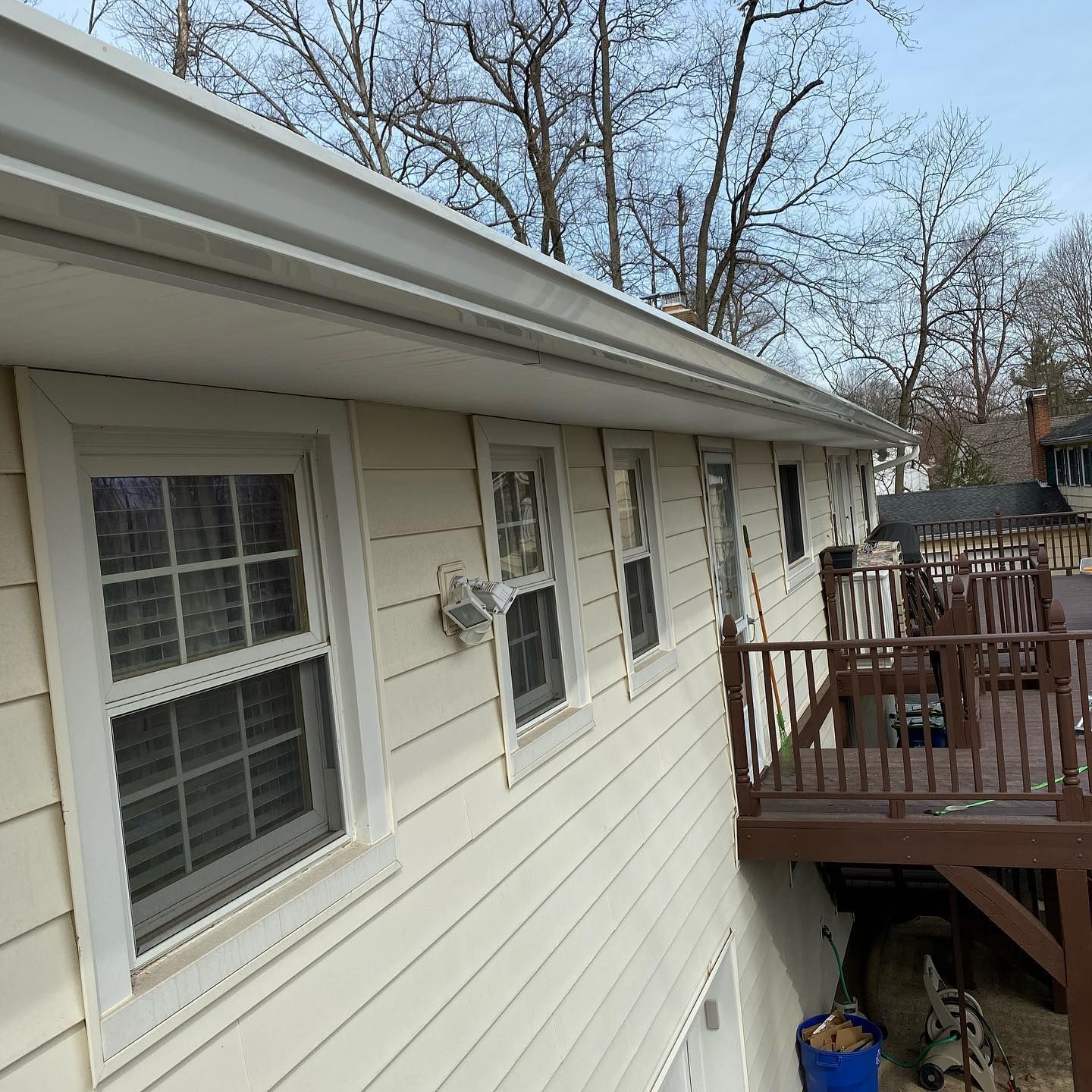 All safe roofing construction new jersey with a balcony and a lot of windows