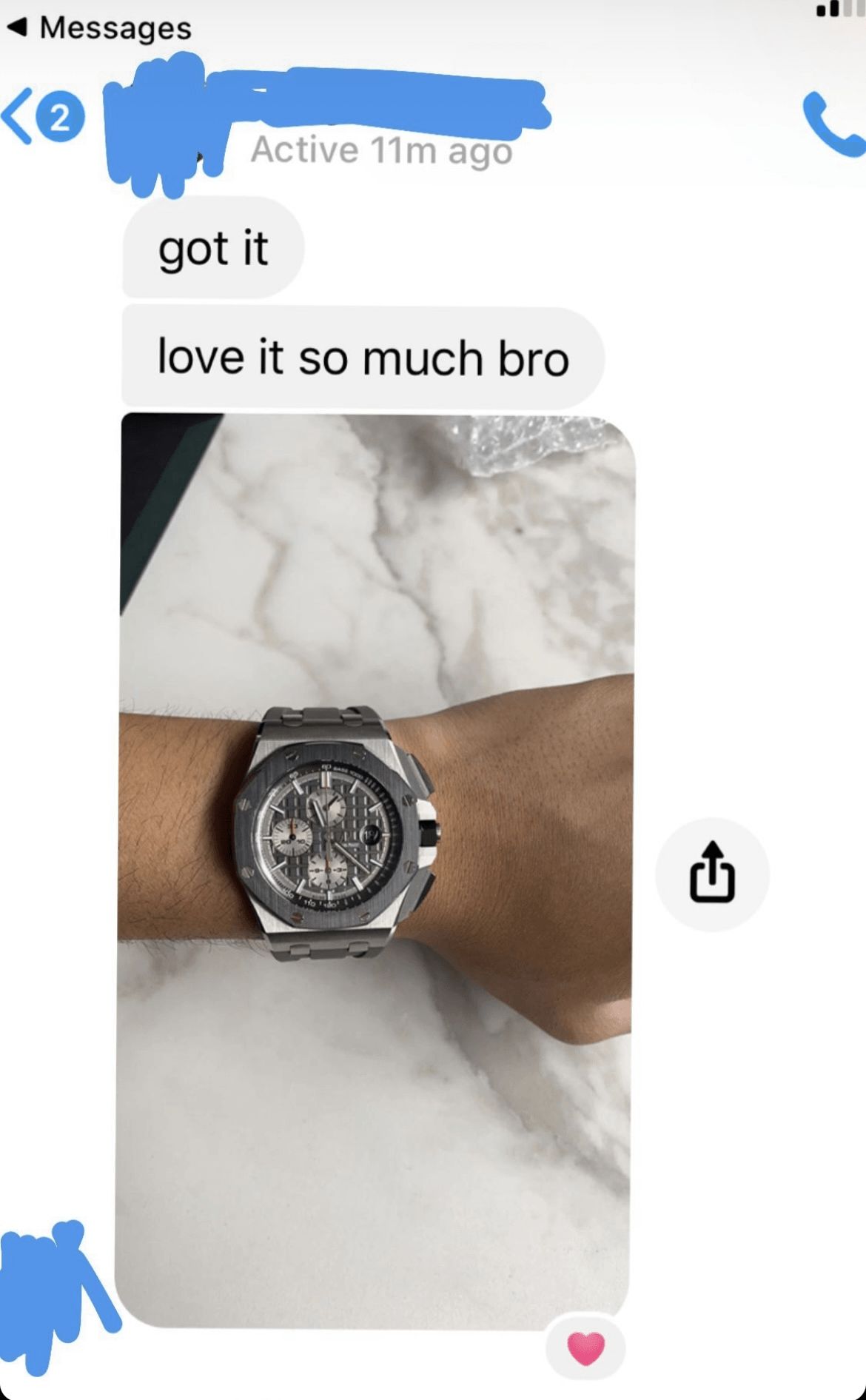 A person is wearing a watch on their wrist.