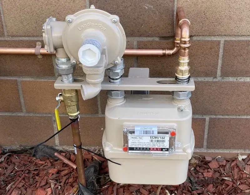 Gas Meter and Regulator Mounted on a Building Exterior — All Stars Plumbing In Barrack Heights, NSW