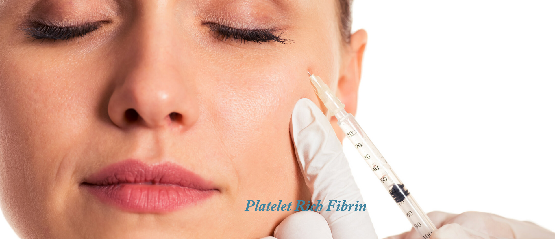 A woman is getting a botox injection in her face.