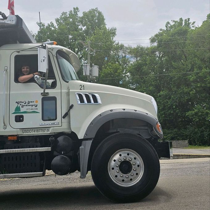 A white truck with the number 21 on it