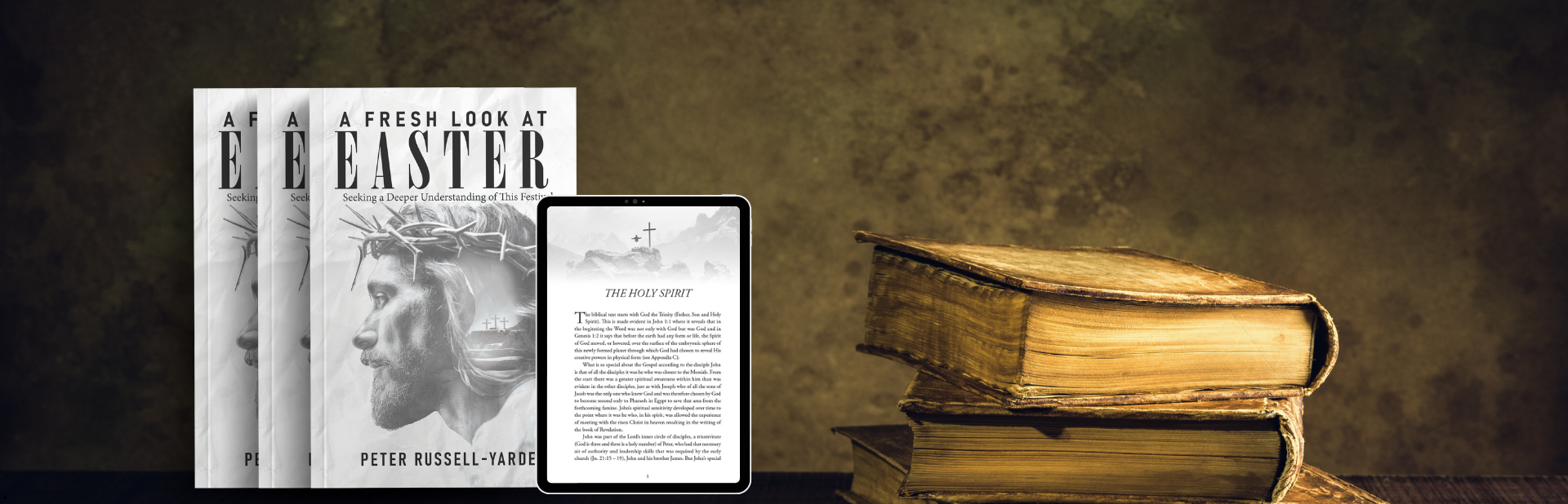 E-reader displaying text next to a stack of physical books on a wooden table. Bookshelf in background.