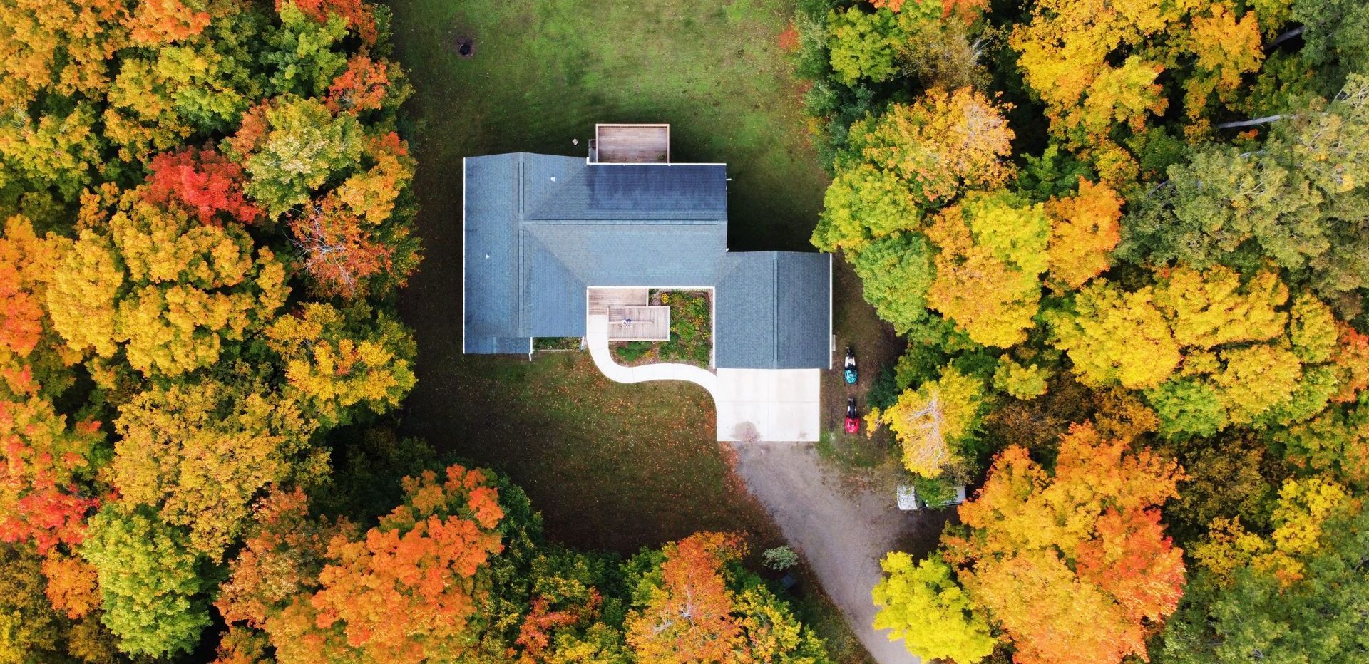 house with fall trees