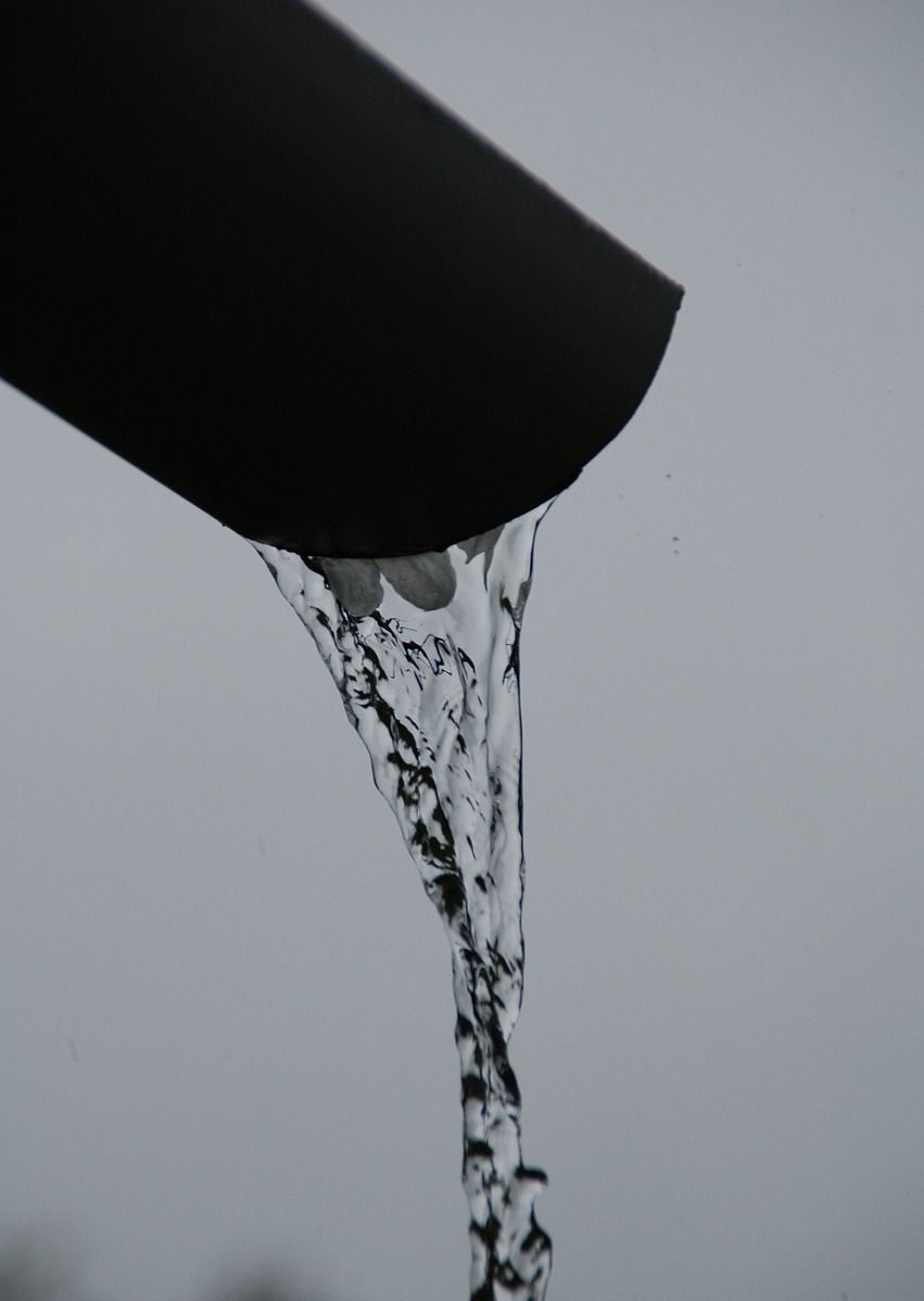 water coming out of a downspout