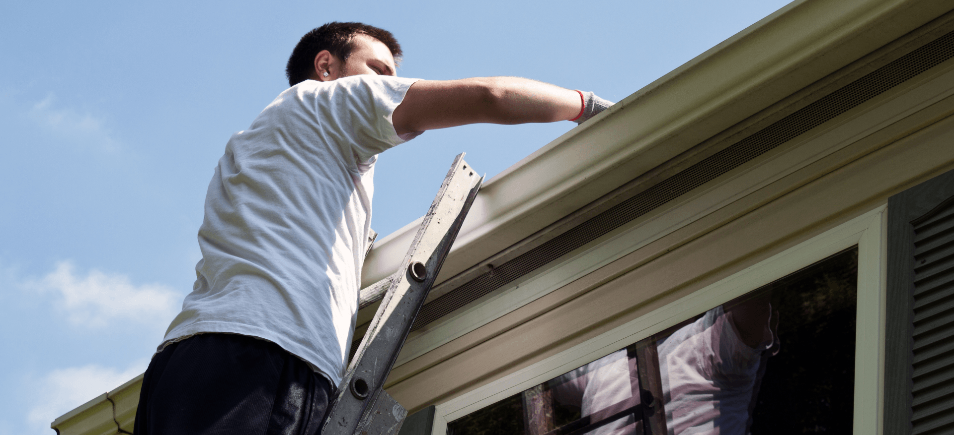 cleaning a gutter