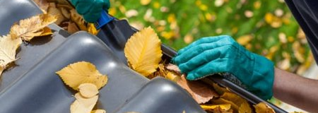 cleaning a gutter