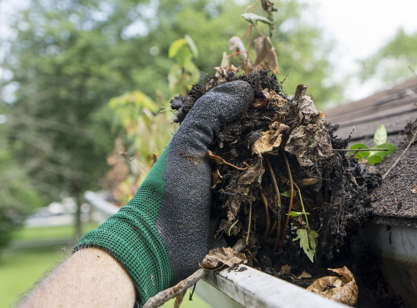 cleaning a gutter