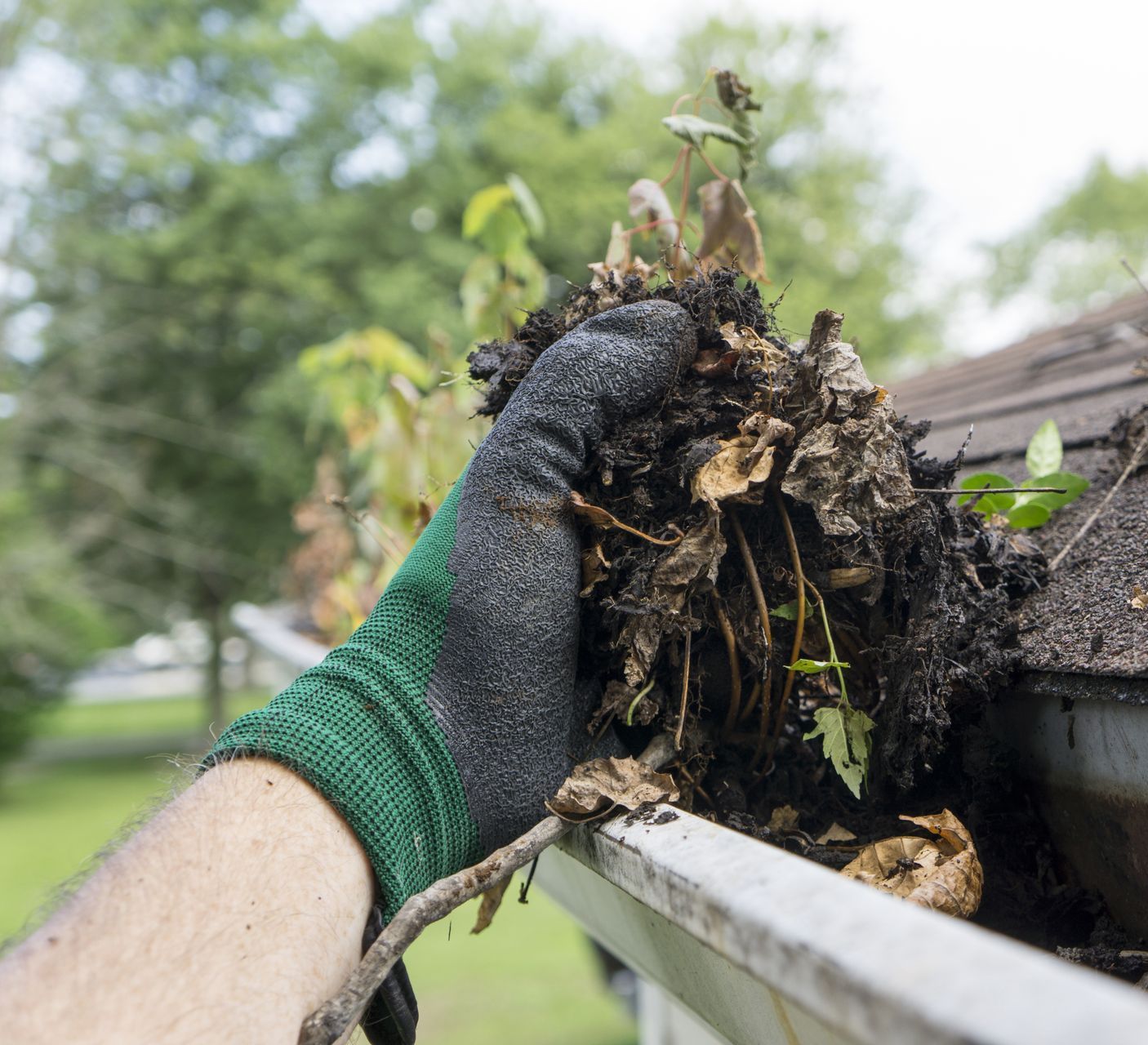 cleaning a gutter