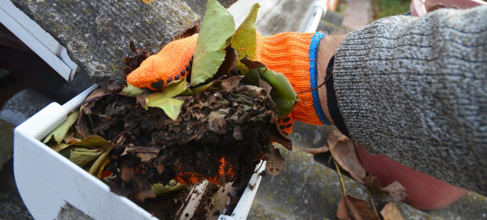 cleaning a gutter