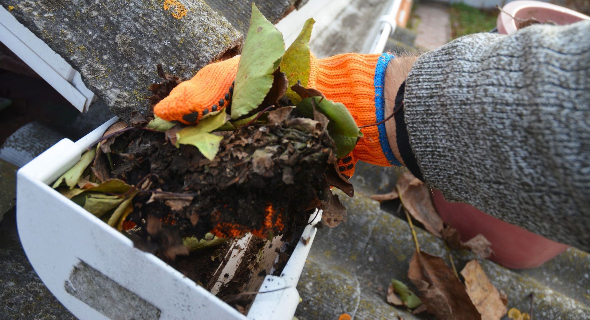 cleaning a gutter