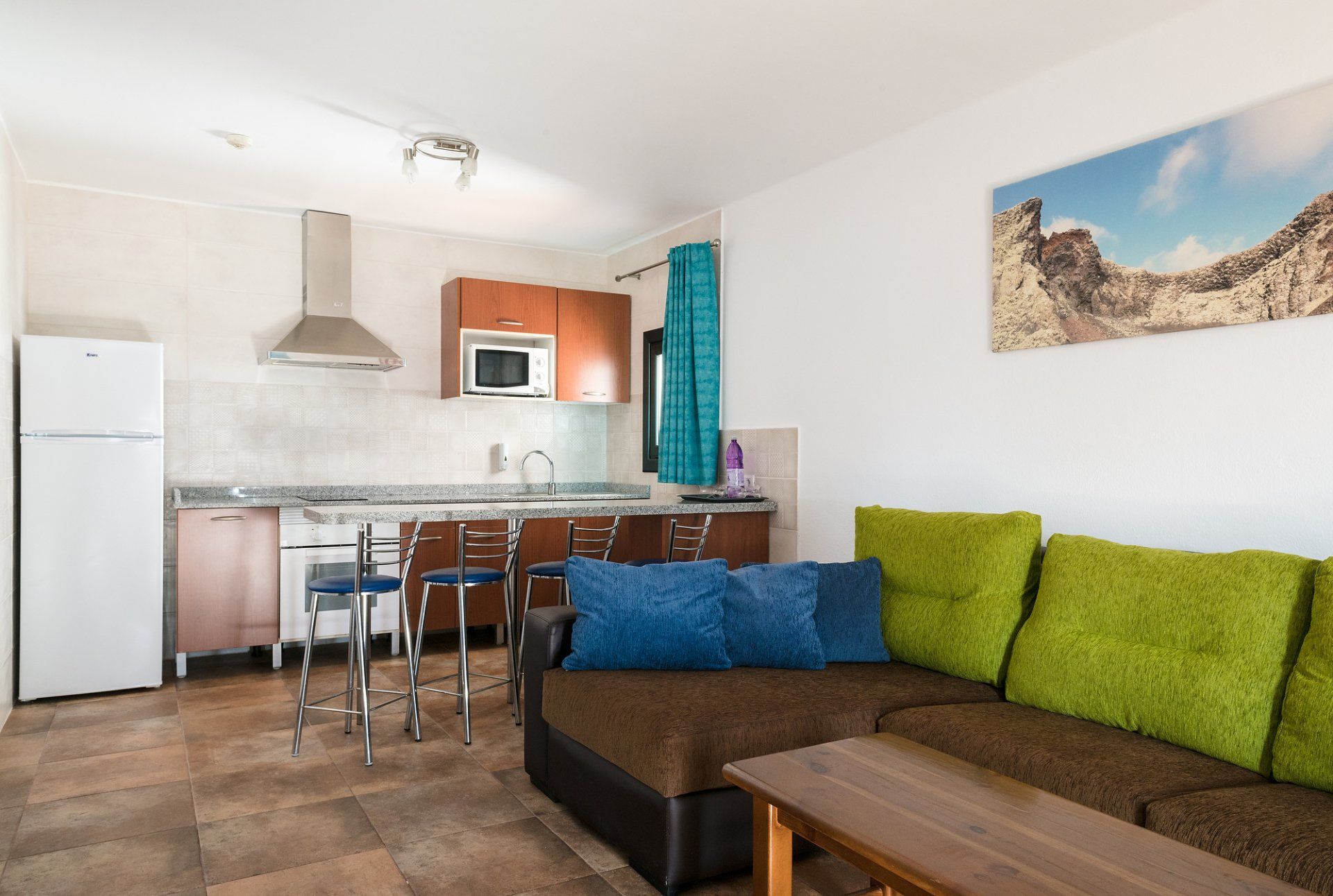 Living room with sofa and Equipped kitchen at 2 bedrooms apartment in Villa Canaima Apartments 