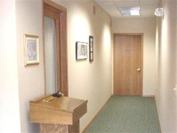 A long hallway with a podium in the middle