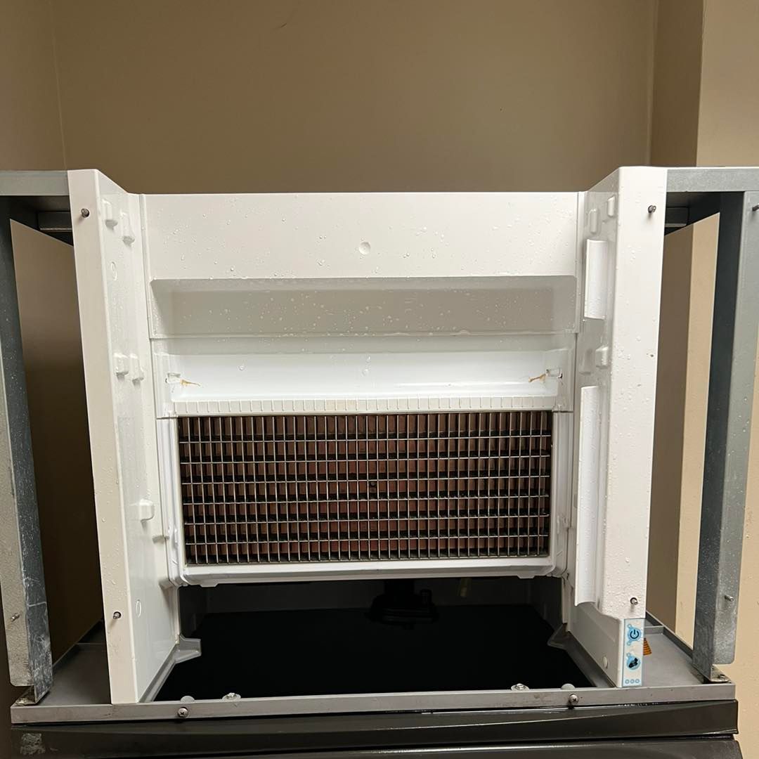 The inside of a refrigerator with the door open