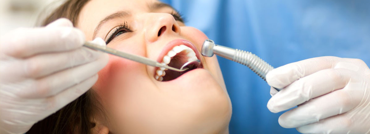 oral cancer screening - woman at the dentist