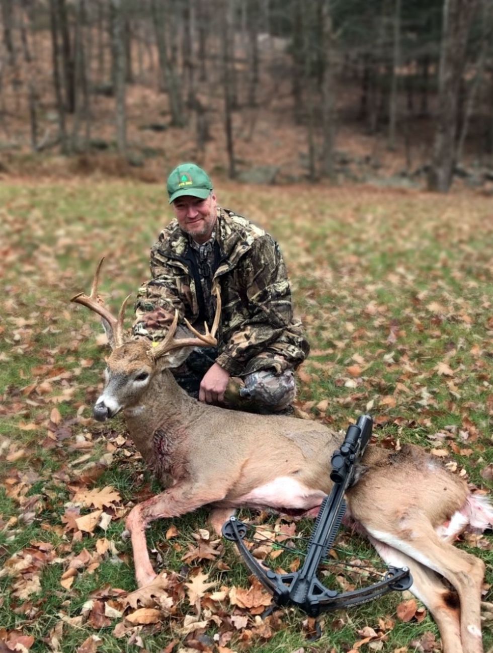 Expert hunting guide Thomas Sanford with a buck