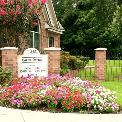 Flowers in Front of An Office — San Marcos, TX — Diamondback Landscaping & Lawn Care, Inc.