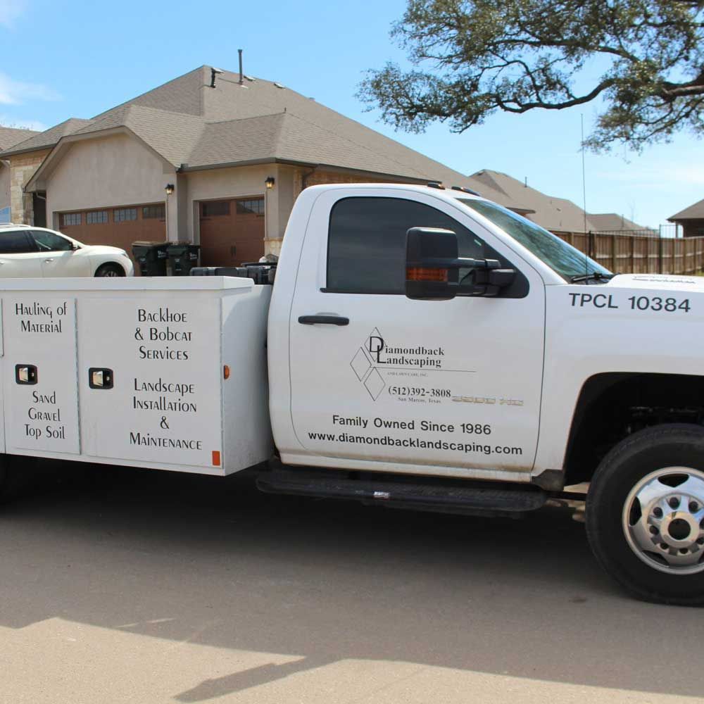 White Service Truck — San Marcos, TX — Diamondback Landscaping & Lawn Care, Inc.