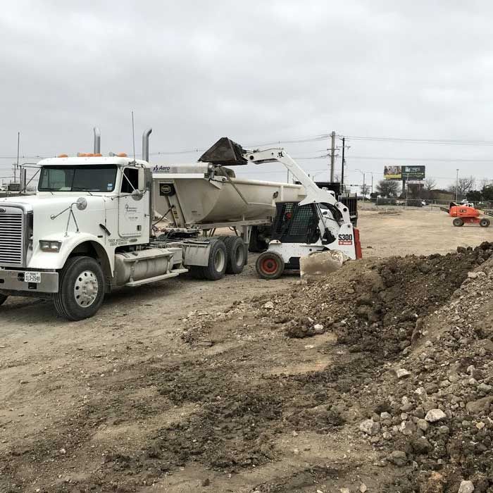 Moving Dirt to Truck — San Marcos, TX — Diamondback Landscaping & Lawn Care, Inc.