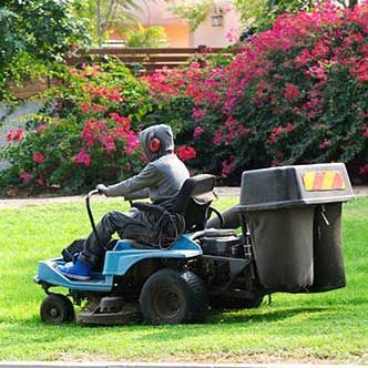 Riding a Lawn Mower — San Marcos, TX — Diamondback Landscaping & Lawn Care, Inc.