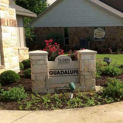House with A Signage — San Marcos, TX — Diamondback Landscaping & Lawn Care, Inc.