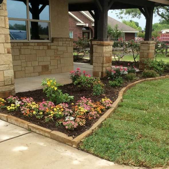 Flower Bed in Front of The House — San Marcos, TX — Diamondback Landscaping & Lawn Care, Inc.