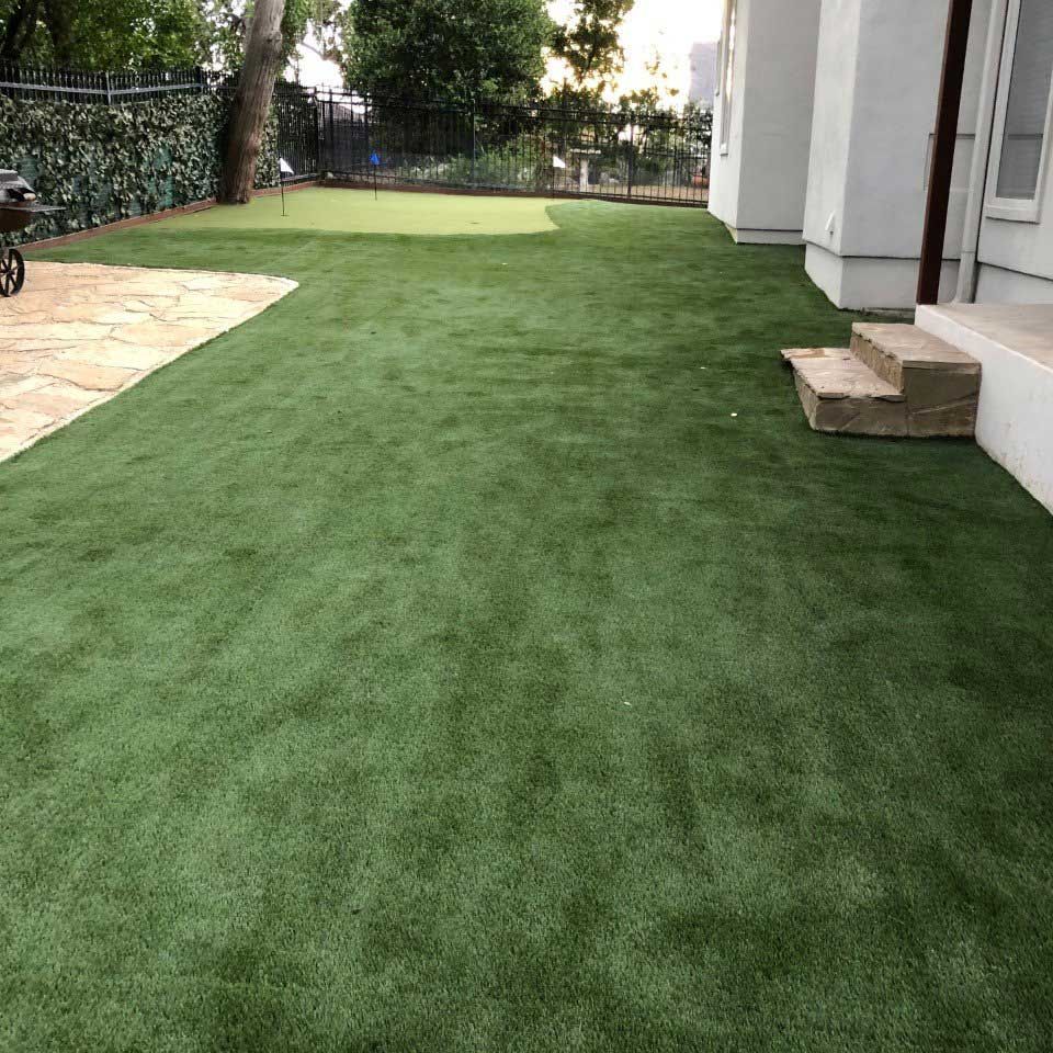 Backyard with Artificial Turf — San Marcos, TX — Diamondback Landscaping & Lawn Care, Inc.