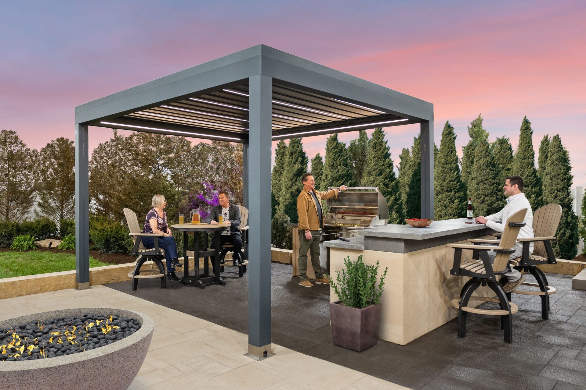 Outdoor entertainment area with pergola, bar, and seating; people socializing. Sunset background.