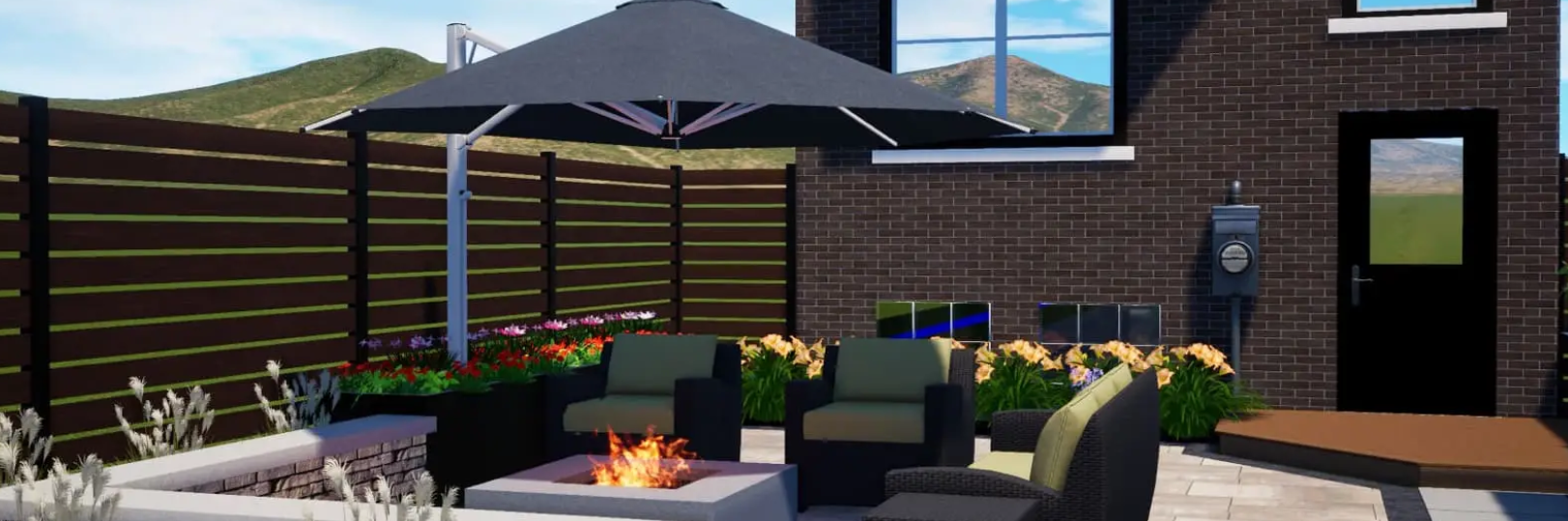 Backyard patio with fire pit, seating, umbrella, and brick house. Green mountains in the background.