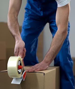Packaging the Cardboard Boxes — Herndon, VA — Eureka Van & Storage Co., Inc.