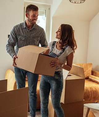 Couple Unpacking the Boxes — Herndon, VA — Eureka Van & Storage Co., Inc.